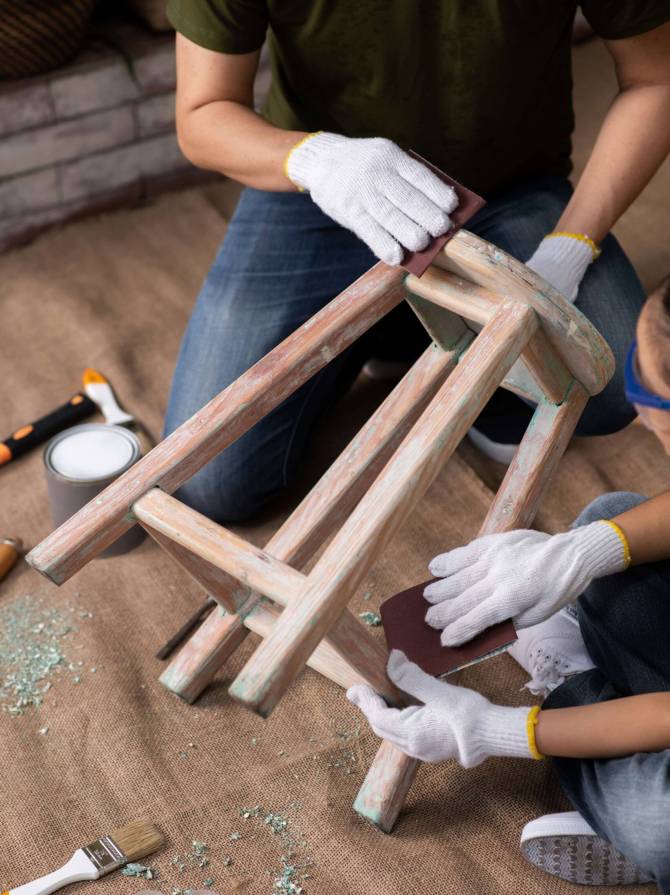 high-angle-people-using-sandpaper